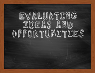 EVALUATING IDEAS AND OPPORTUNITIES handwritten text on black cha