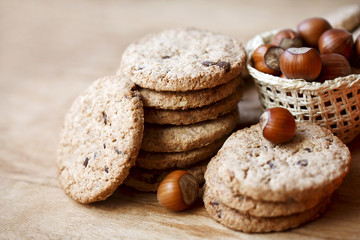 cookie with hazelnuts on a wooden table