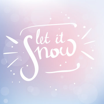 Hand written isolated lettering "Let it snow" on a on blurred pastel background