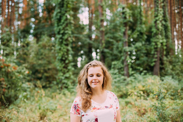 Portrait Of Young Pretty Plus Size Caucasian Girl With Closed Ey