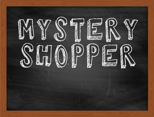 MYSTERY SHOPPER handwritten text on black chalkboard