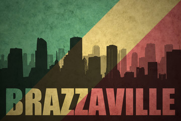 abstract silhouette of the city with text Brazzaville at the vintage congolese flag © luzitanija