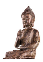 Buddha Shakyamuni's figure in a manual pose - vitarka mudra. The old statue made of metal isolated...