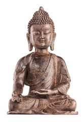 Buddha Shakyamuni's figure in a blessing pose - varada mudra. The old statue made of metal isolated on a white background.