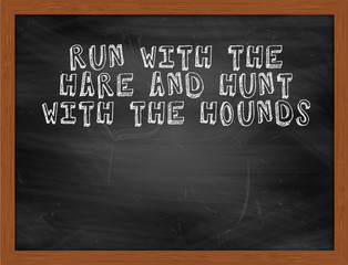 RUN WITH THE HARE AND HUNT WITH THE HOUNDS handwritten text on b
