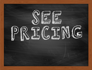 SEE PRICING handwritten text on black chalkboard