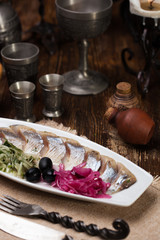 Herring with onions and black olives cabbage
