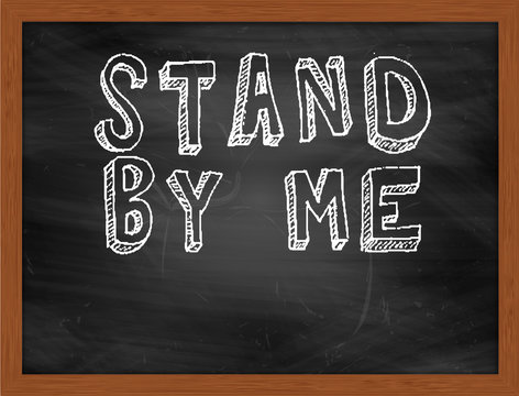 STAND BY ME Handwritten Text On Black Chalkboard