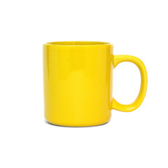 Big yellow empty tea or coffee cup isolated on white background front view closeup