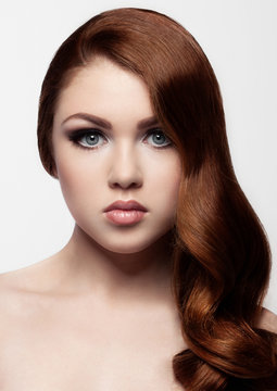 Ginger red long hair.Fashion girl portrait