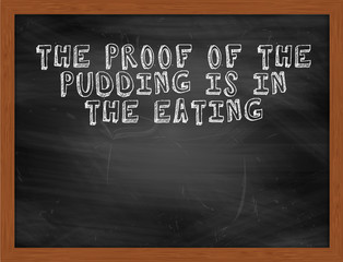 THE PROOF OF THE PUDDING IS IN THE EATING handwritten text on bl