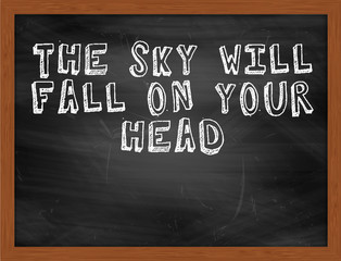 THE SKY WILL FALL ON YOUR HEAD handwritten text on black chalkbo