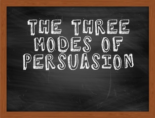 THE THREE MODES OF PERSUASION handwritten text on black chalkboa