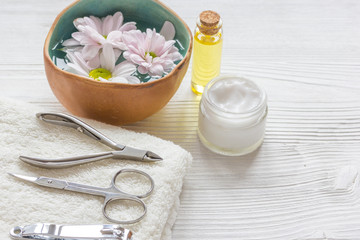 Obraz na płótnie Canvas oil and cream for nail care in spa