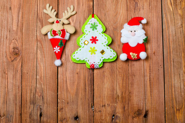 Christmas decorations: reindeer, Santa Claus and Christmas tree