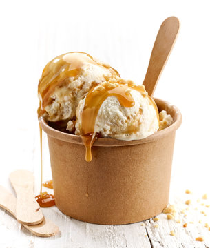 ice cream with caramel sauce and ground nuts