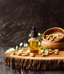 jar of oil almond, black stone, for spa, selective focus