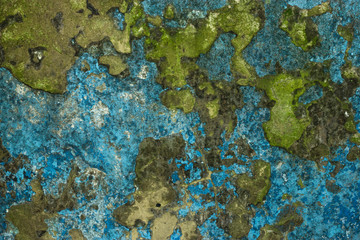 Old texture of retro pattern wall with a shabby blue paint. Grunge, material, aged, wall background.