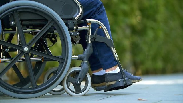 3 in 1 video! The woman walk with a disabled on the wheelchair. Slow motion