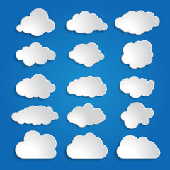 set of white clouds on a blue sky background