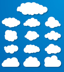 set of white clouds on a blue background