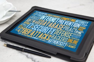 tablet with it security word cloud