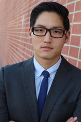 Confident modern business man with glasses