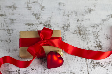 gift wrapped with a red bow