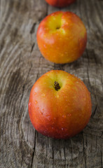 Nectarines with water drops on rough rustic wooden background cl