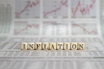 inflation word on a newspaper