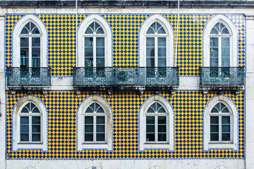 typical lisbon architecture. tile azulejos facade with windows