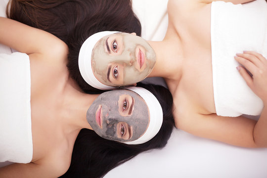 Use Of A Face Mask To The Face Two Young Women In A Beauty Salon