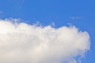 White clouds in a deep blue sky