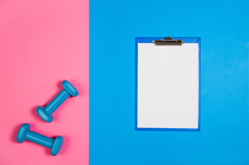 Sport, fitness and healthy lifestyle concept image on bright colorful background. Photograph taken from above, top view.