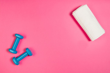 Sport, fitness and healthy lifestyle concept image on bright colorful background. Photograph taken from above, top view.