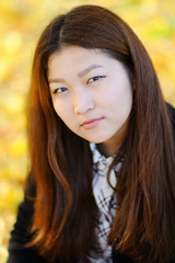Fototapeta premium Pretty asian girl outdoors portrait