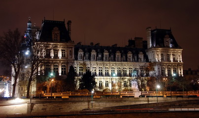 Fototapeta na wymiar Hotel-de-Ville. City Hall in Paris at night - building housing City of Paris administration. Building was constructed between 1874 -1882, architects Theodore Ballou and Edouard Deperta. France