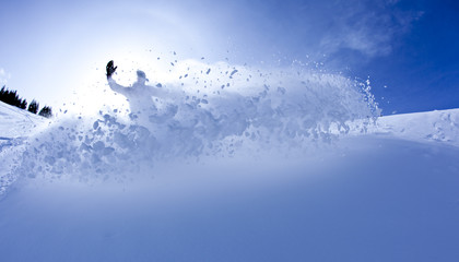 Snowboarder in powder