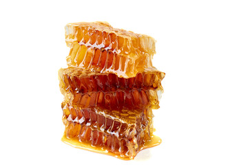 Stack of honeycombs slices on white