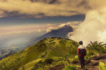 Man on Mountain Peak Watching the Natural View