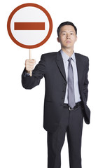 Fototapeta premium Businessman holding no entry sign