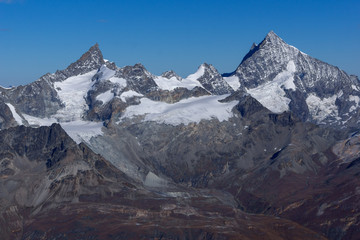Fototapeta premium Winter landscape from matterhorn glacier paradise Swiss Alps, Switzerland
