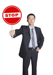 man holding stop sign