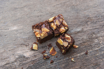 Delicious cake chocolate walnut brownies on wooden desk