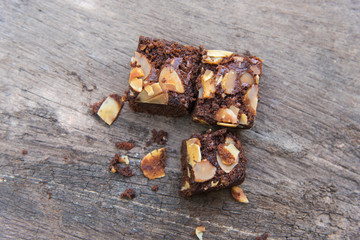 Delicious cake chocolate walnut brownies on wooden desk