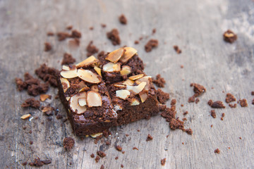 Delicious cake chocolate walnut brownies on wooden desk