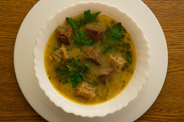 Vegetable soup with toasts