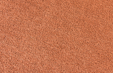Close up of orange rubber floor background.