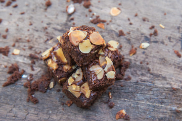 Delicious cake chocolate walnut brownies on wooden desk