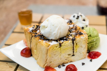 honey toasts with strawberry, vanilla and green tea ice-cream